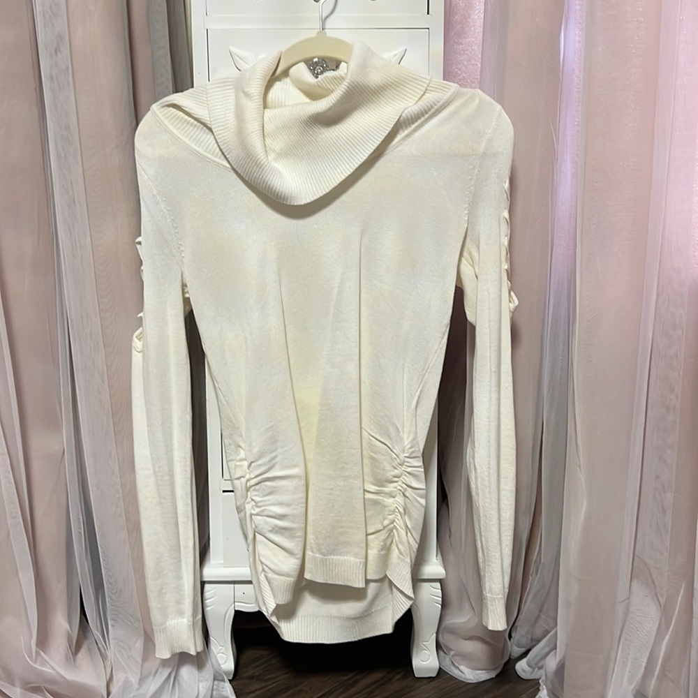 A cream sweater